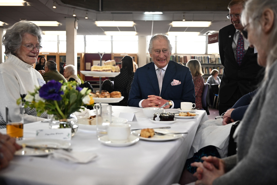 At Colchester Library, The King and The Queen Consort joined Age UK for an afternoon tea with local volunteers, service users and The Silver Line staff