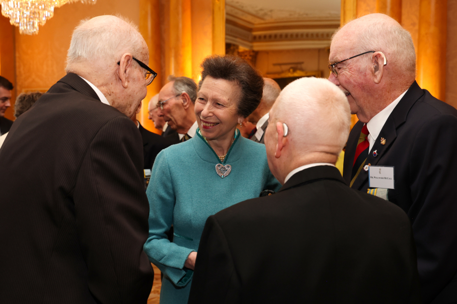 The Princess Royal engaging in conversation with Korean war veterans. 
