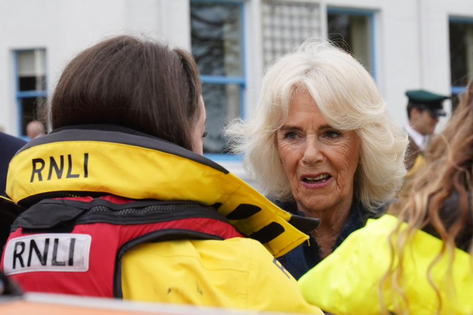 Queen Camilla meets representatives from the RNLI during a visit to Government House, in Onchan, Isle of Man. 