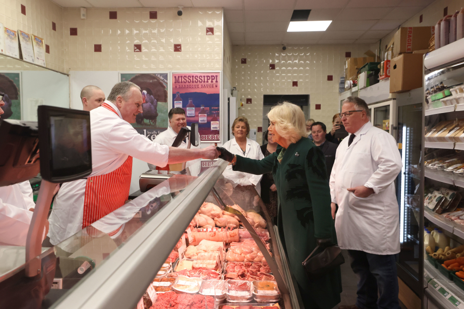 Queen Camilla meets staff at Coffey's Butchers during a visit to Lisburn Road in Belfast.
