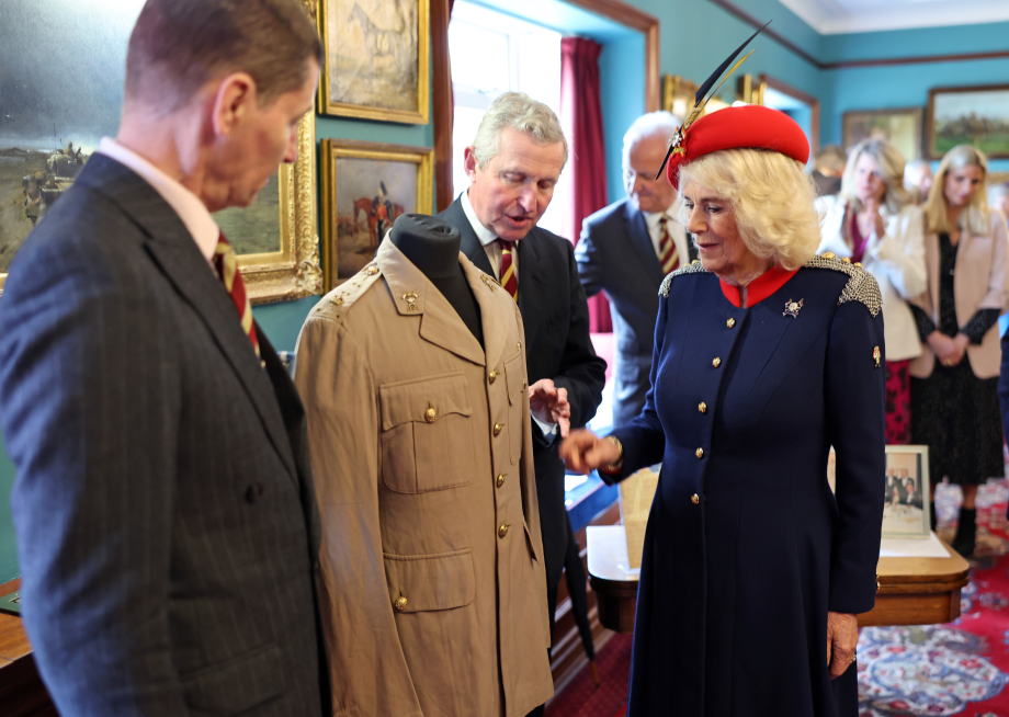 The Queen is shown a tunic belonging to her late father