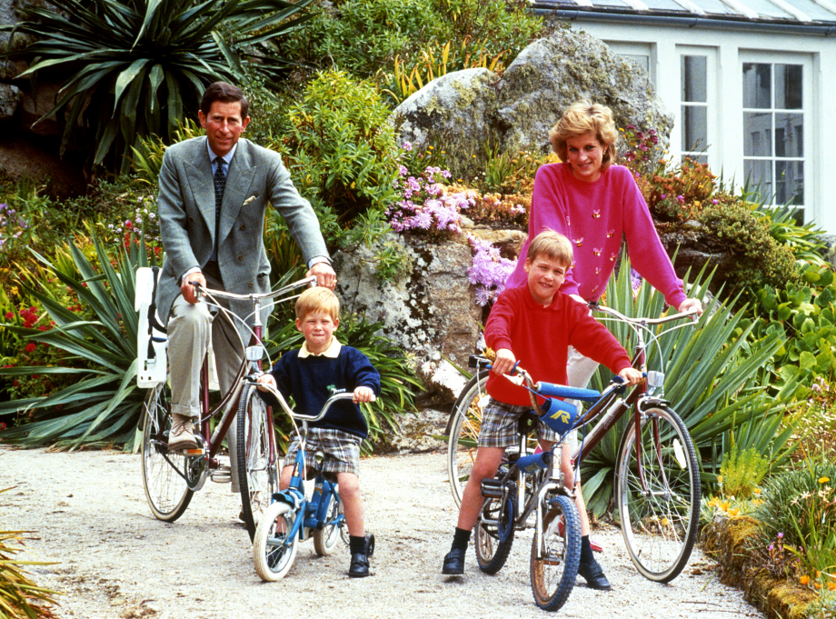The Prince and Princess of Wales with sons Prince William and Prince Harry during a holiday in the Scilly Isles, 1989.