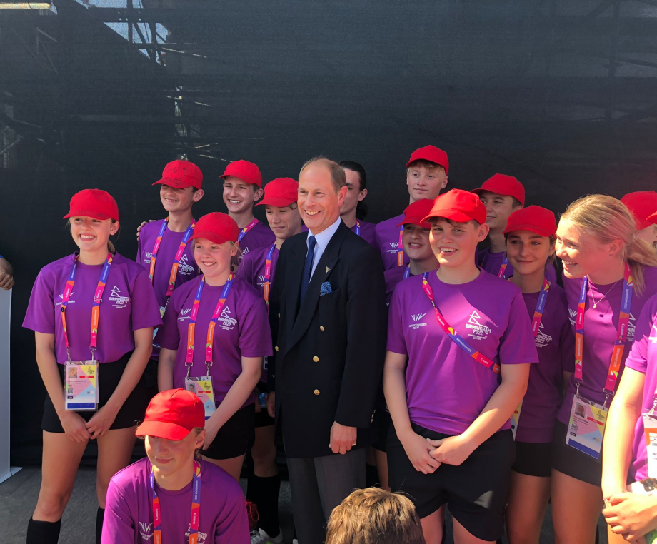 The Earl of Wessex speaks to hockey ball girls and boys and the Commonwealth Games