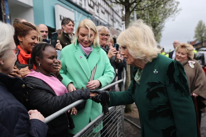 Queen Camilla meets members of the public during a visit to Lisburn Road in Belfast.