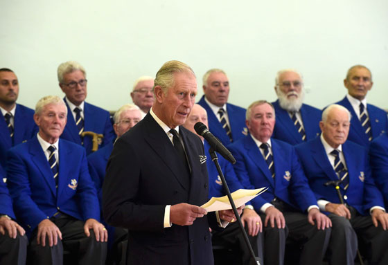 The Prince of Wales reads a message from Queen Elizabeth II during a reception for families and survivors at Aberfan and Merthyr Vale community centre in Aberfan, Wales, on the 50th anniversary of the tragedy