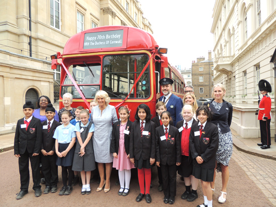 The Duchess with the authors and school children at Clarence House
