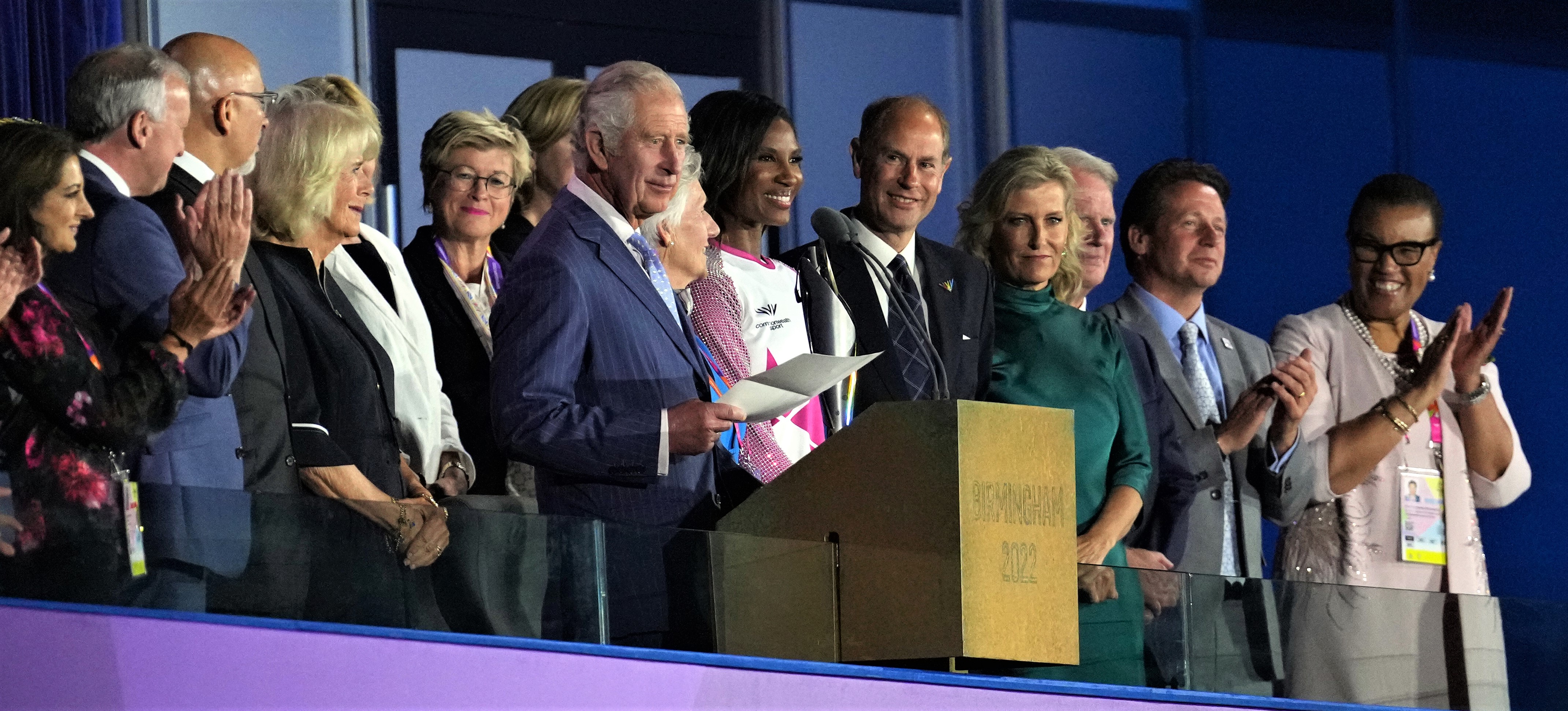 The Prince of Wales reads a letter from The Queen