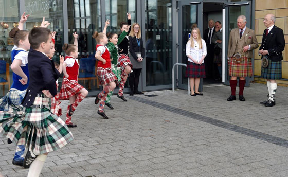 The Lord of the Isles watches Highland dancers