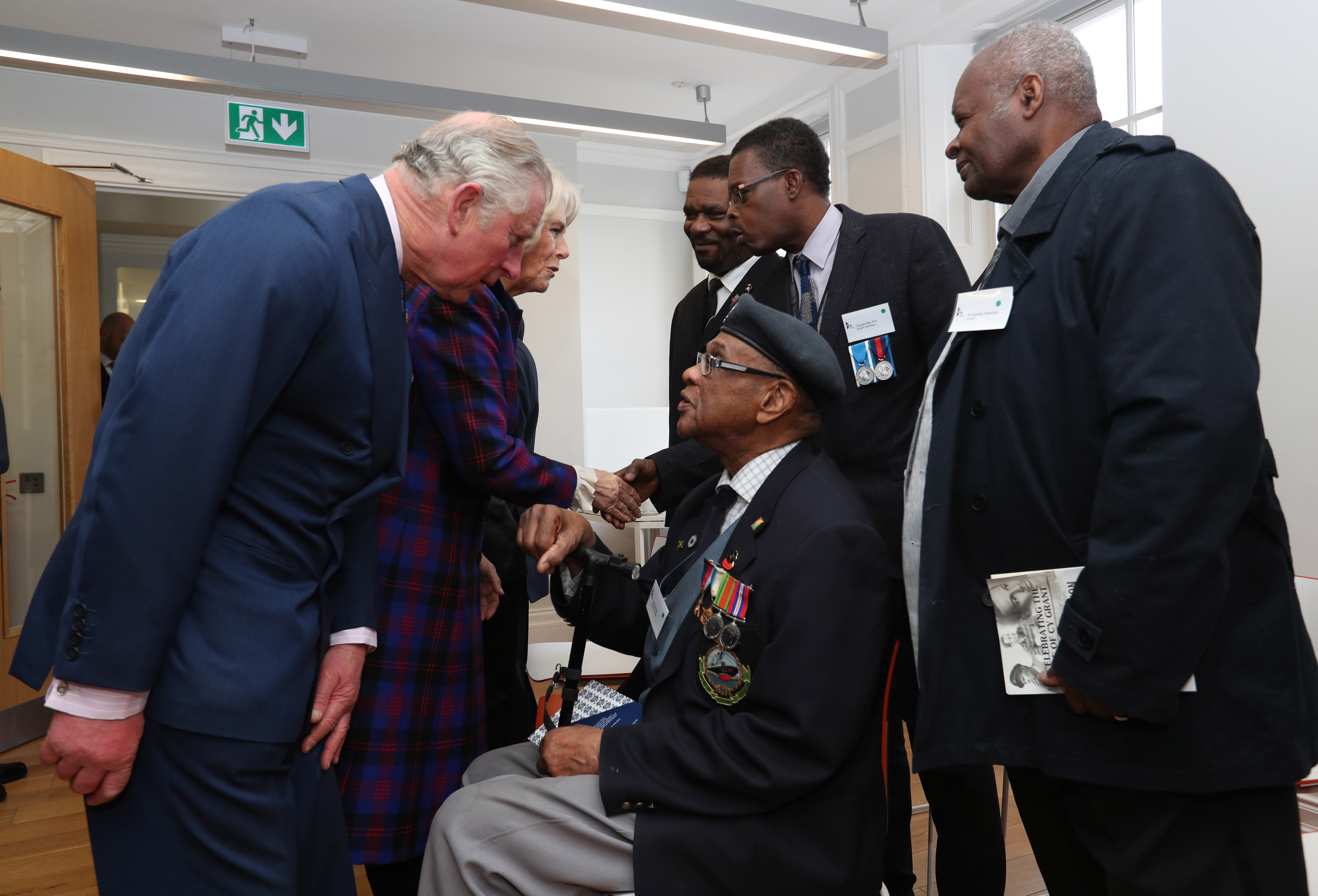 The Prince of Wales and The Duchess of Cornwall meet Windrush veterans in 2017