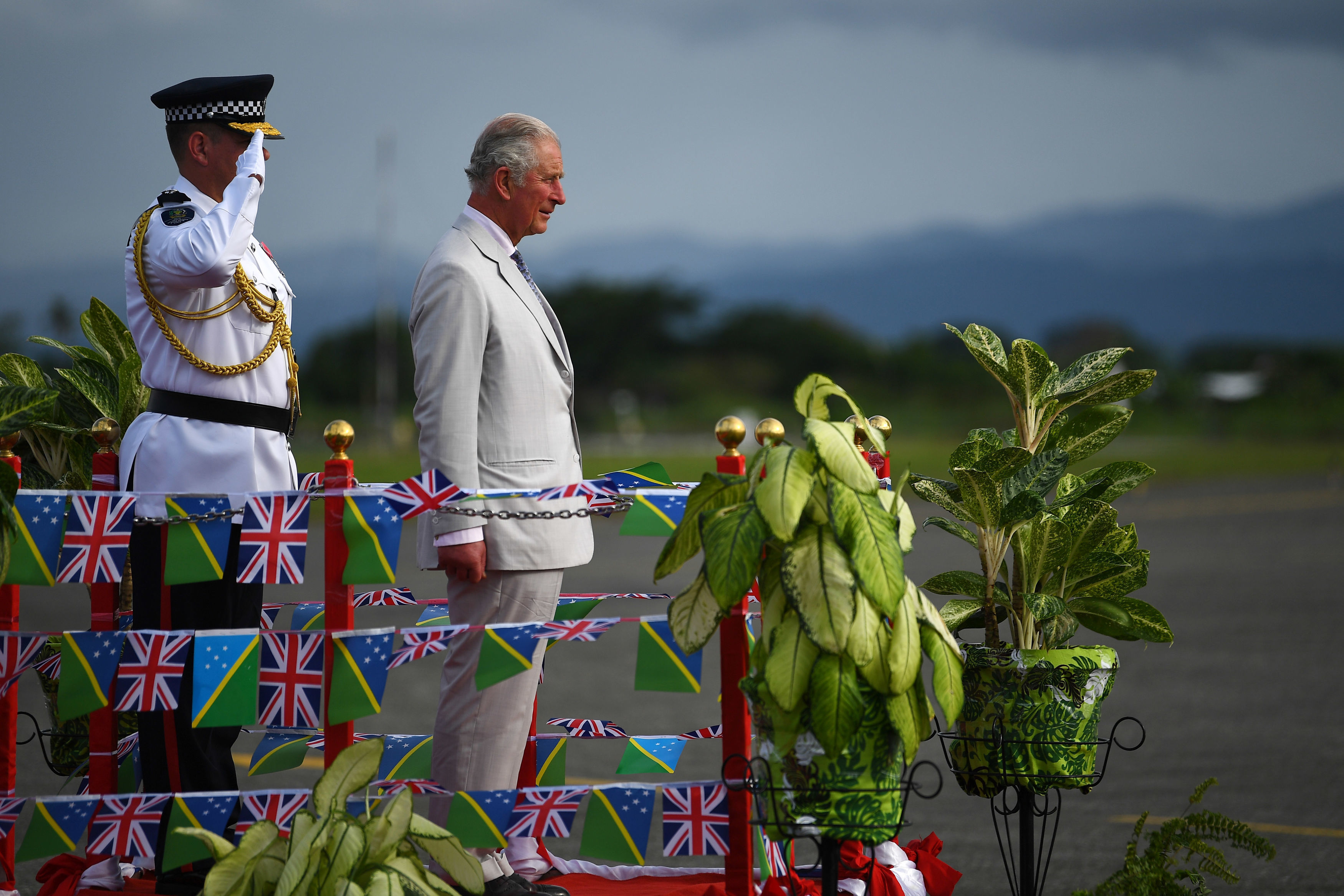 The Prince inspects the guard at Honiara International Airport
