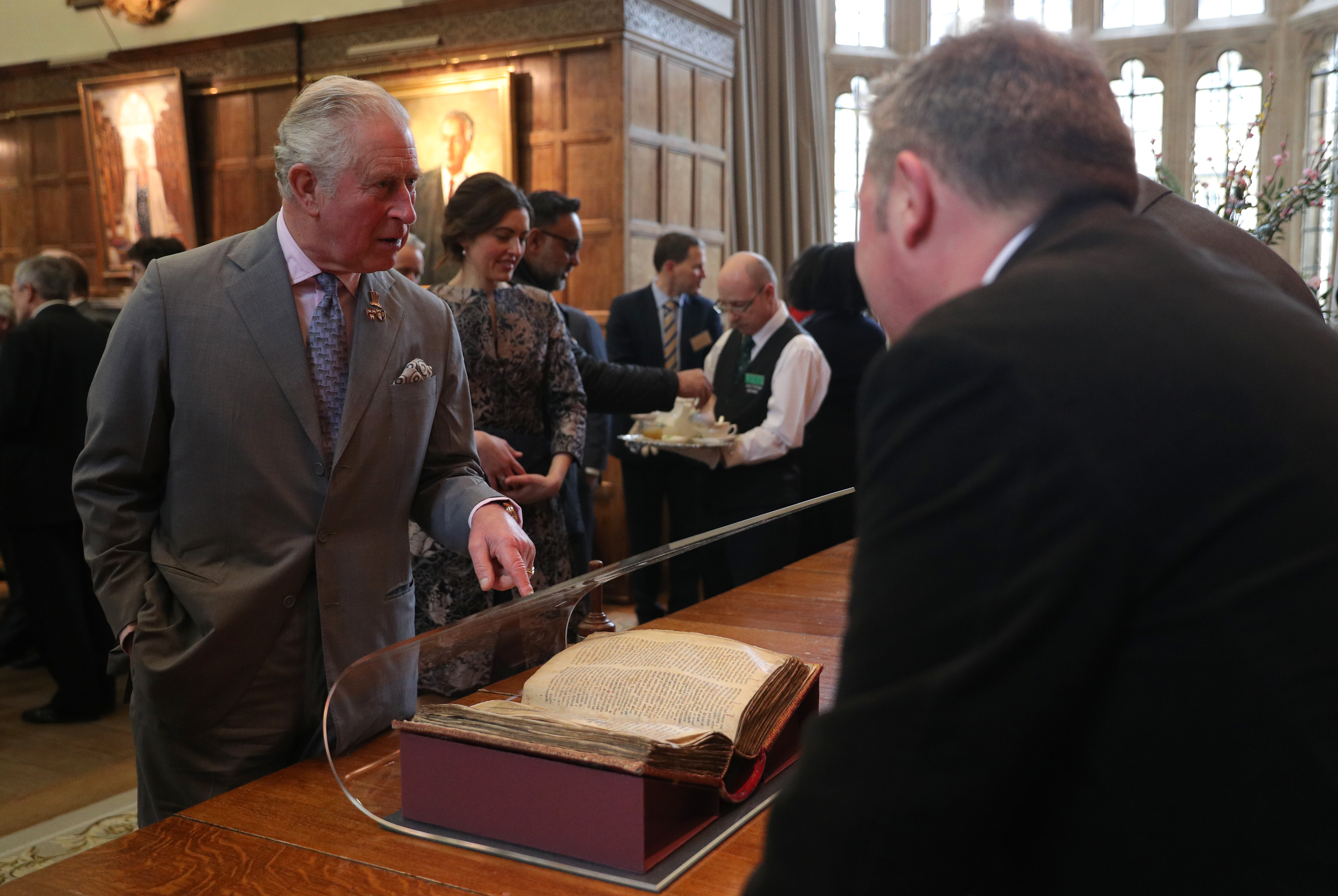 The Prince viewing a medieval manuscript