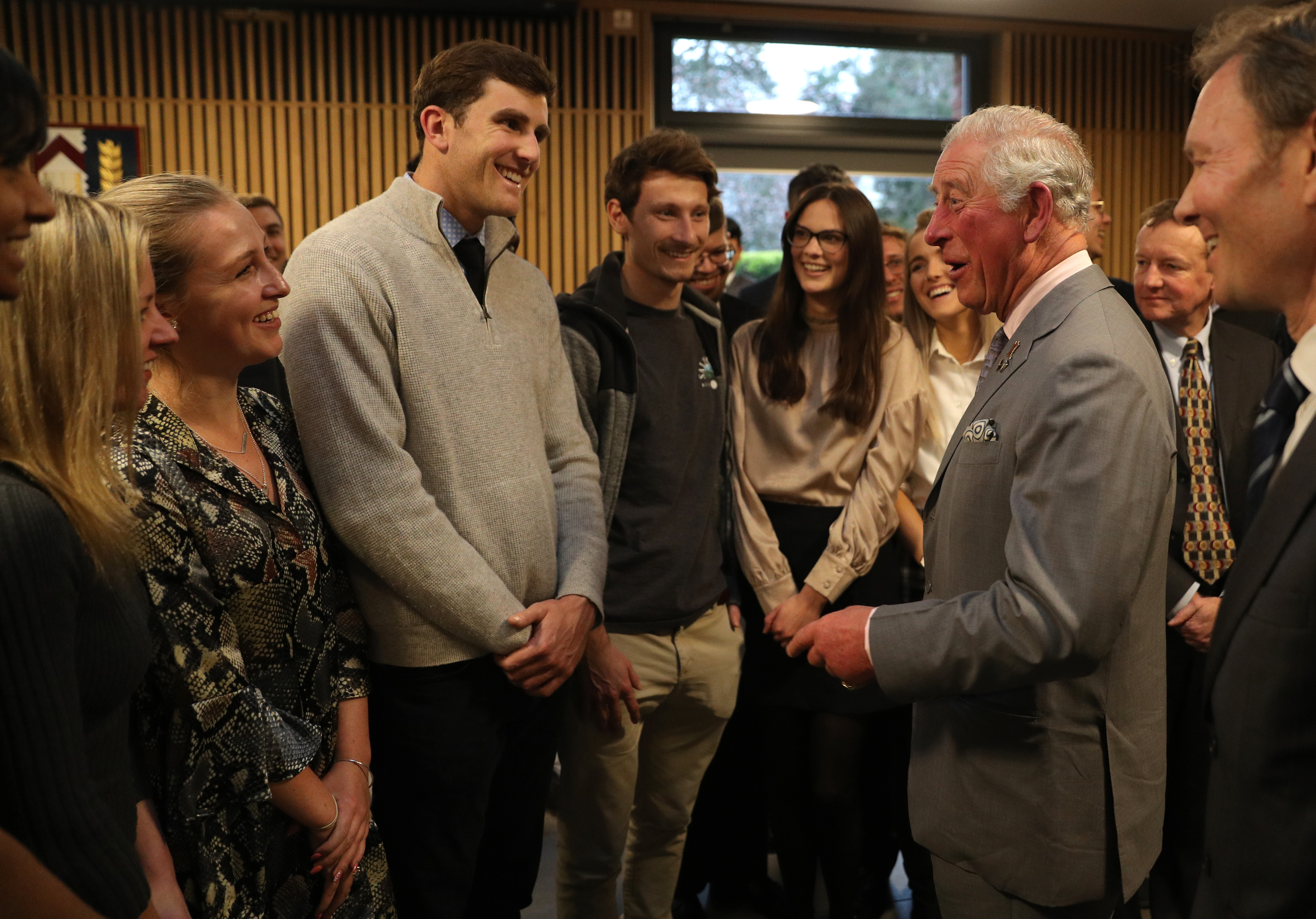 HRH meeting Kellogg students.