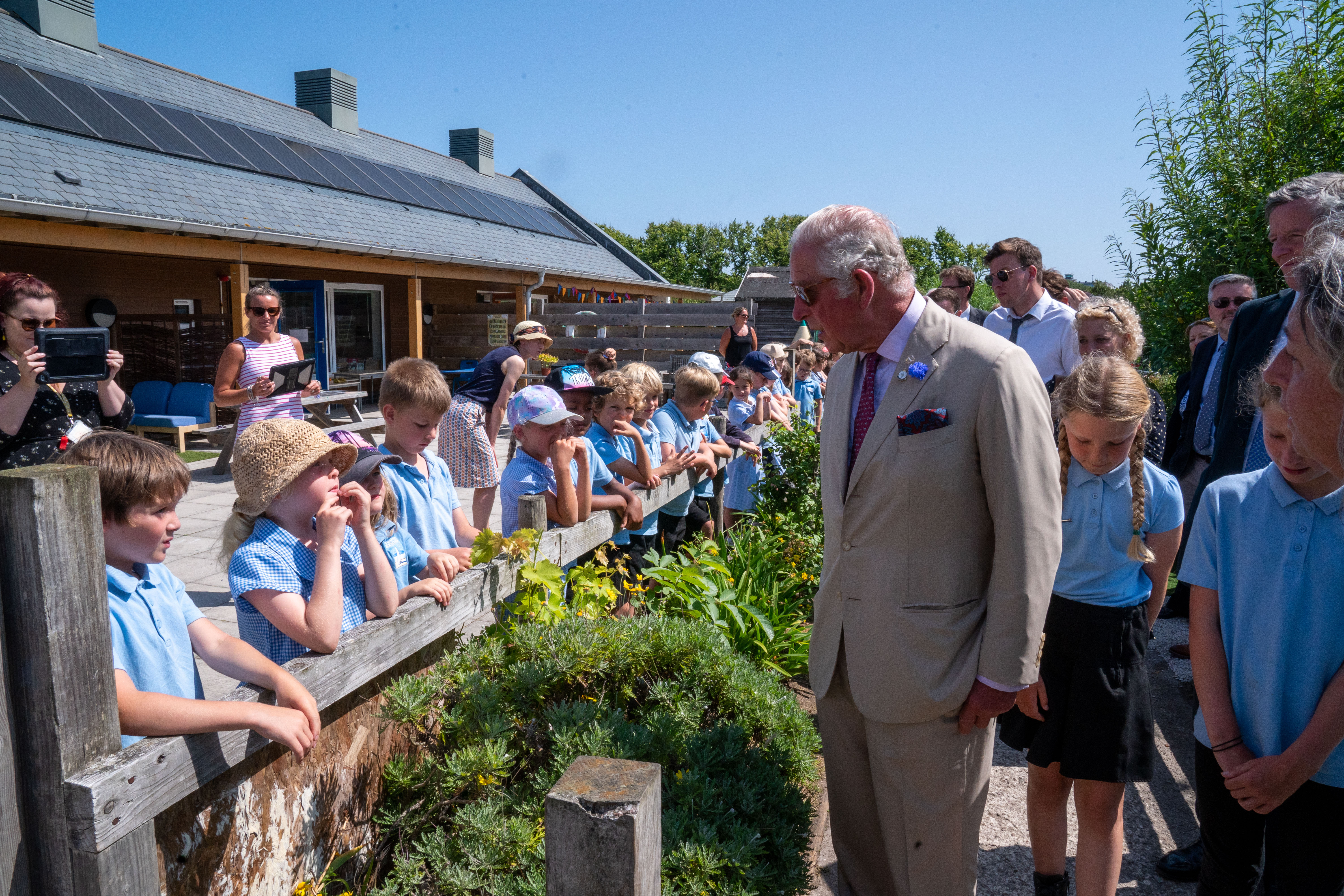 HRH meets children at Five Islands Academy School during a visit to St Mary's, Isles of Scilly