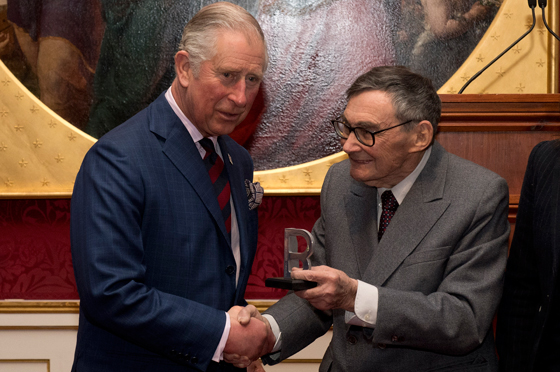 The Prince is presented with the Statue of Remembrance by Marian Turski