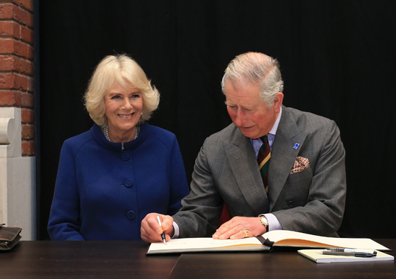 TRH sign the visitors book at Ferens Art Gallery