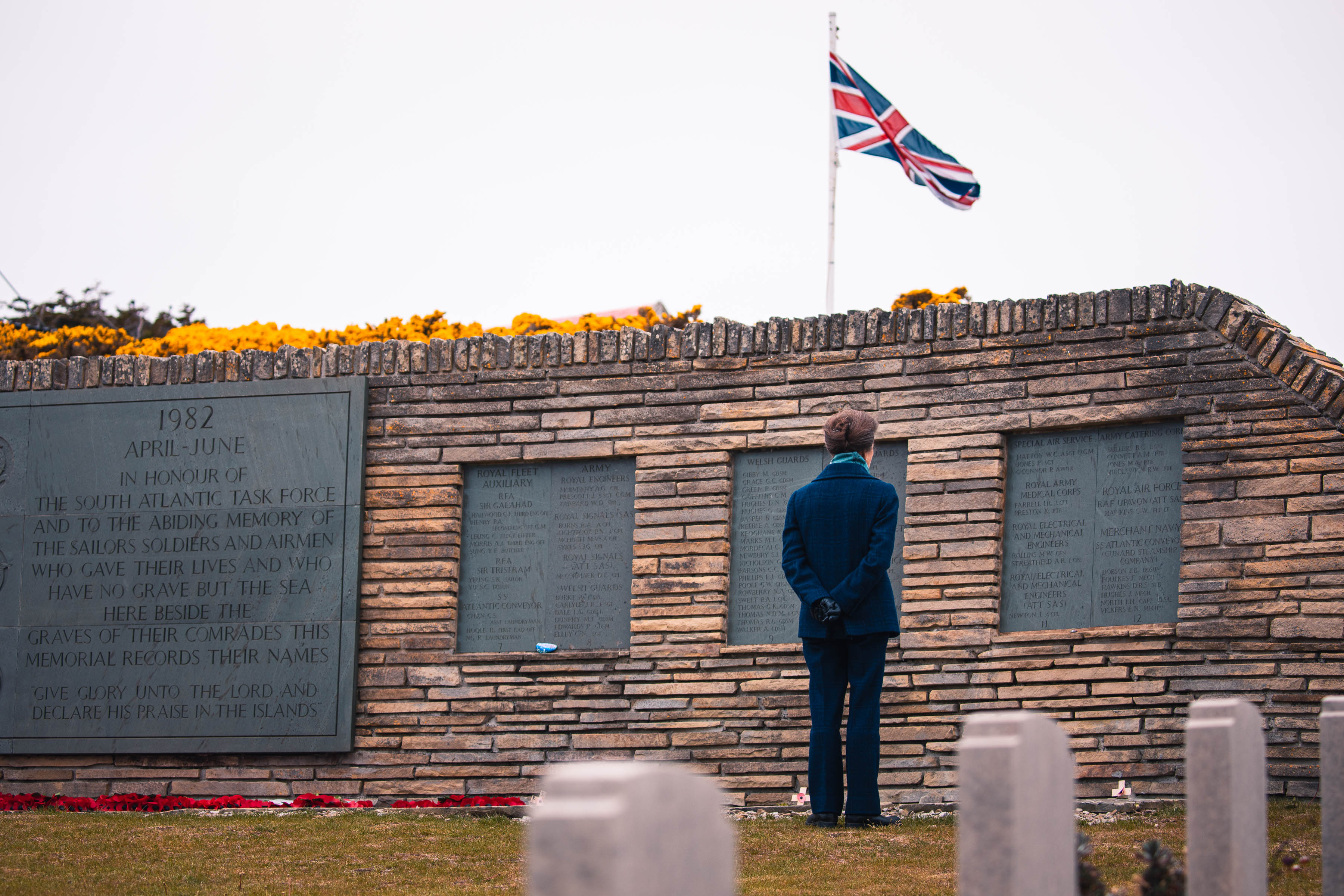 The Princess Royal pays her respects at the Blue Beach military cemetery.