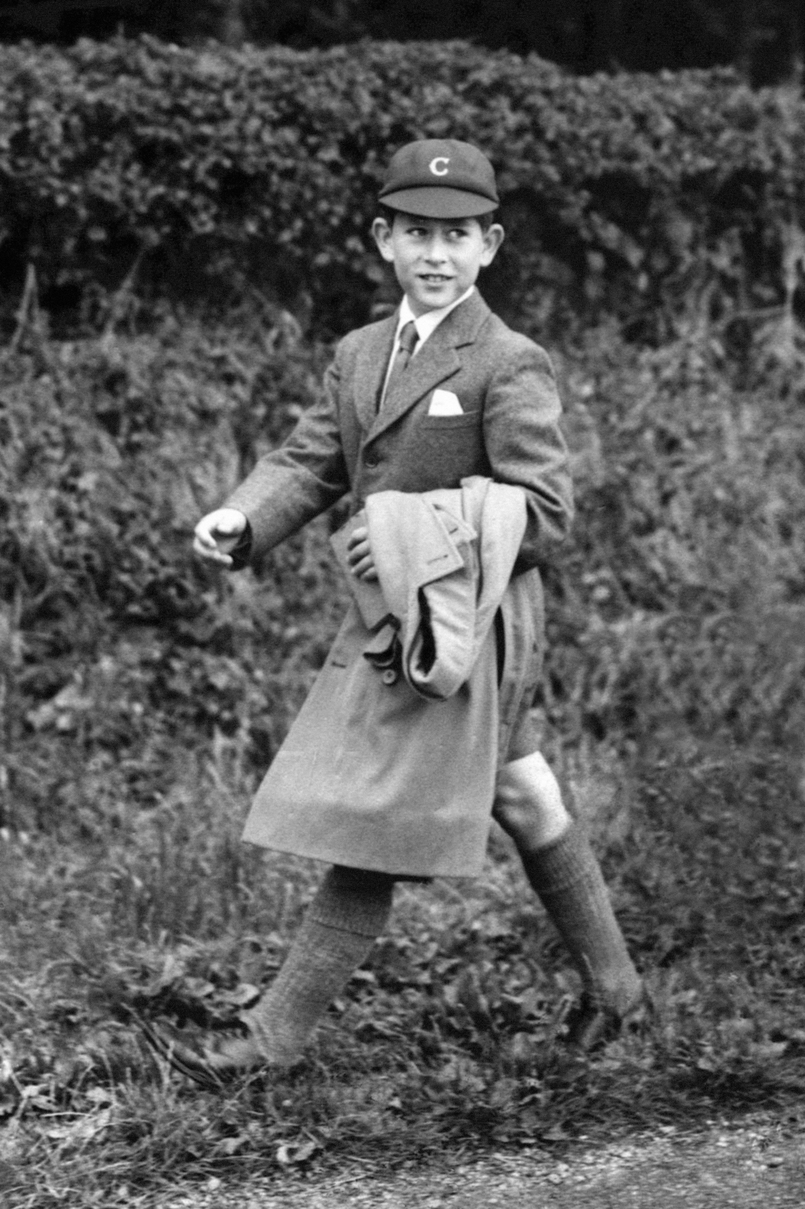 The Prince of Wales walking to Cheam School in Berkshire.