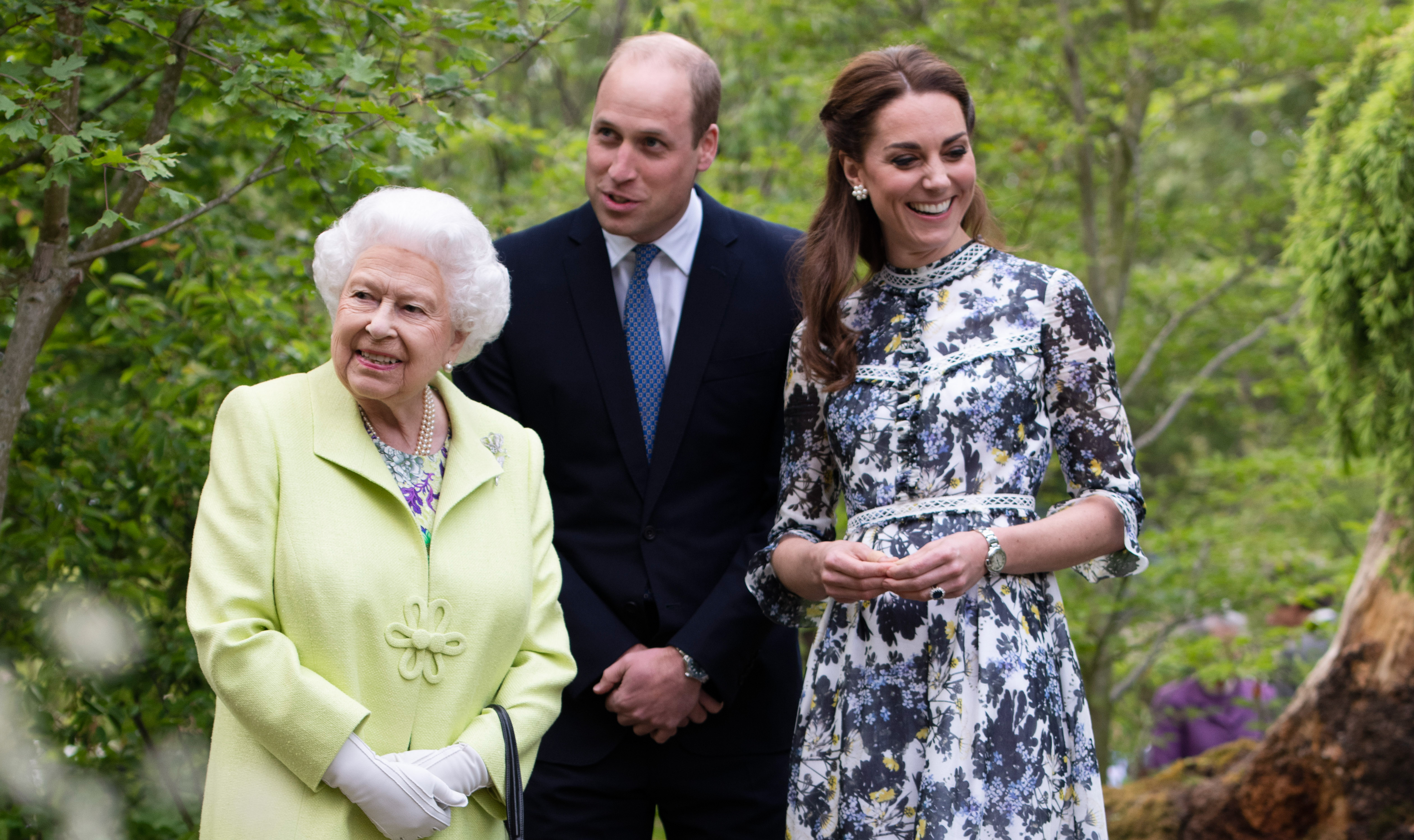 The Queen with The Duke and Duchess of Cambridge in the RHS Back to Nature Garden at the Chelsea Flower Show