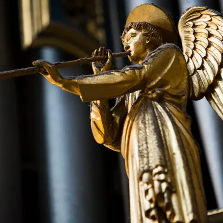 Golden angel with bugle