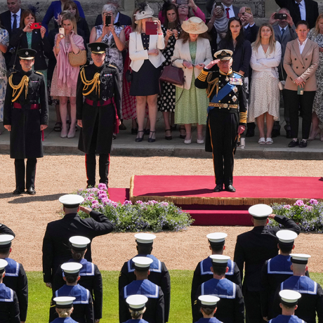 The King presents Royal Navy personnel with RVO medals