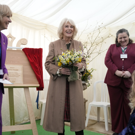 Queen Camilla smiles after unveiling a plaque during a visit to the Swindon Domestic Abuse Support Service's (SDASS) in Wiltshire, to mark the charity's 50th anniversary and highlight their work in support, prevention, education and early intervention, including work with perpetrators of domestic abuse.