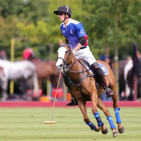 The Prince of Wales riding a horse during the Royal Charity Polo Cup event