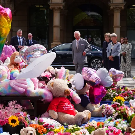 The King views floral tributes in Southport
