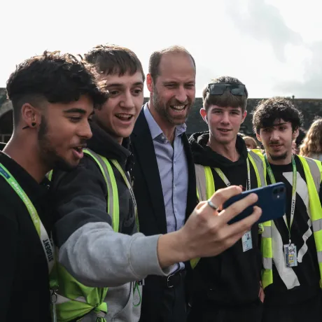 The Duke of Cornwall, Prince William, poses for a selfie with students at Duchy College, Cornwall