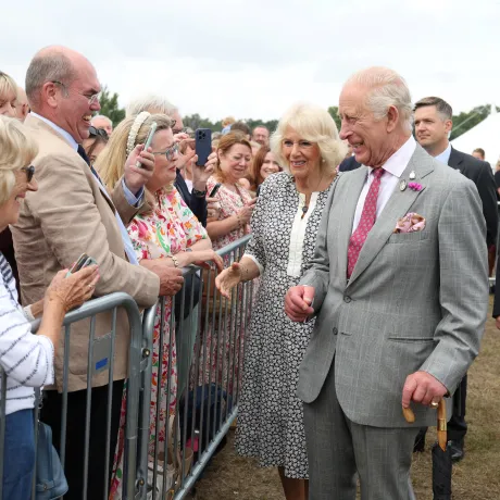 The King and Queen meet members of the public during a visit to Sandringham Flower Show