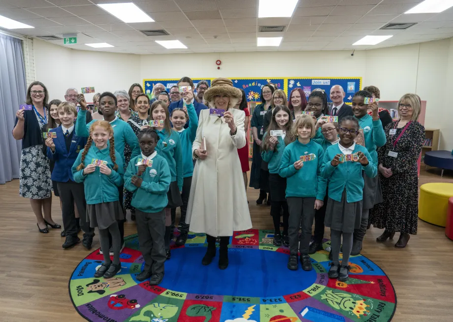 The Queen Consort joins a gathering of local authors, children, supporters and volunteers in the Library