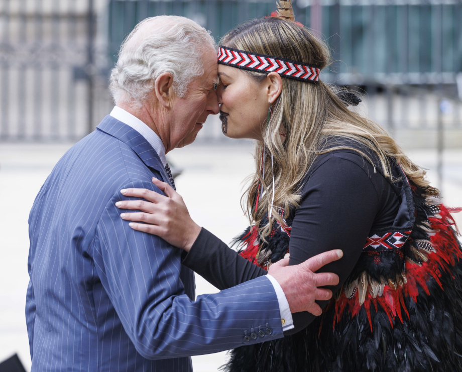 The King is welcomes with a traditional Maori 'Hongi'