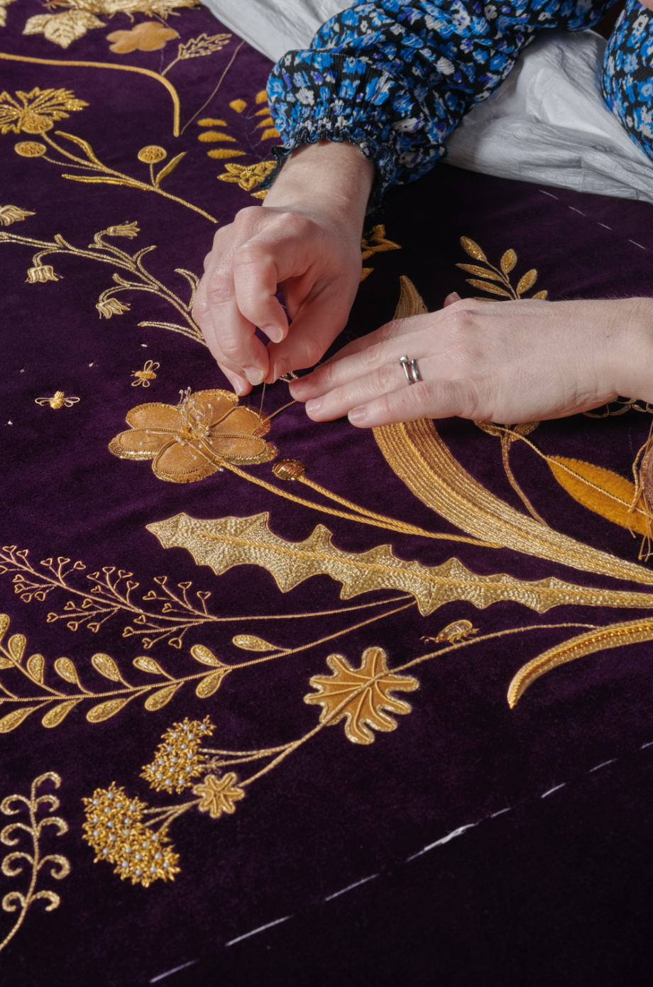 The Royal School of Needlework work on The Queen Consort's Robe of Estate