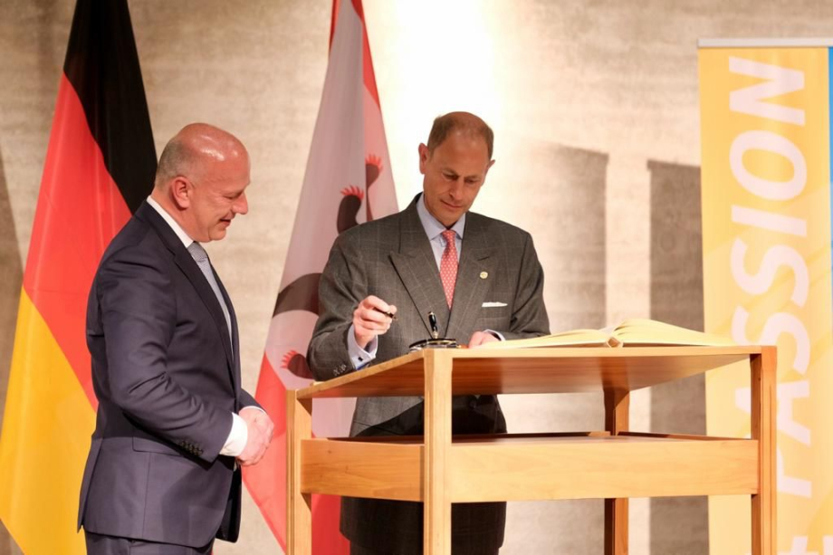 The Duke of Edinburgh signs the Golden Book of Berlin