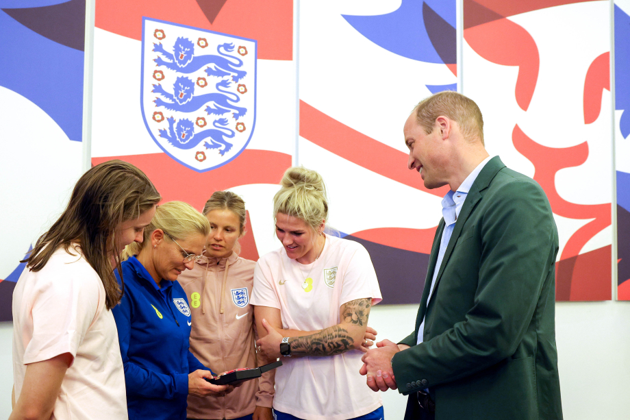 The Prince of Wales presents England Head Coach Sarina Wiegman with Honorary C.B.E.
