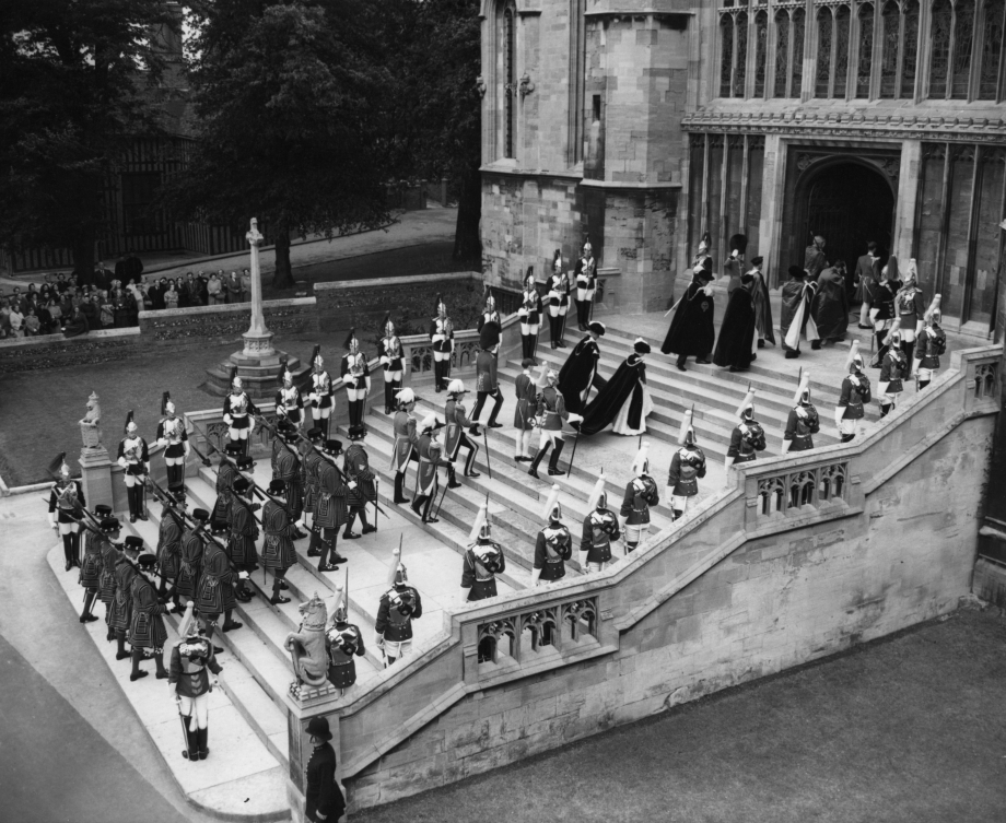 Queen Elizabeth II and Prince Philip enter St George's Chapel for the Order of the Garter Service, 1956.