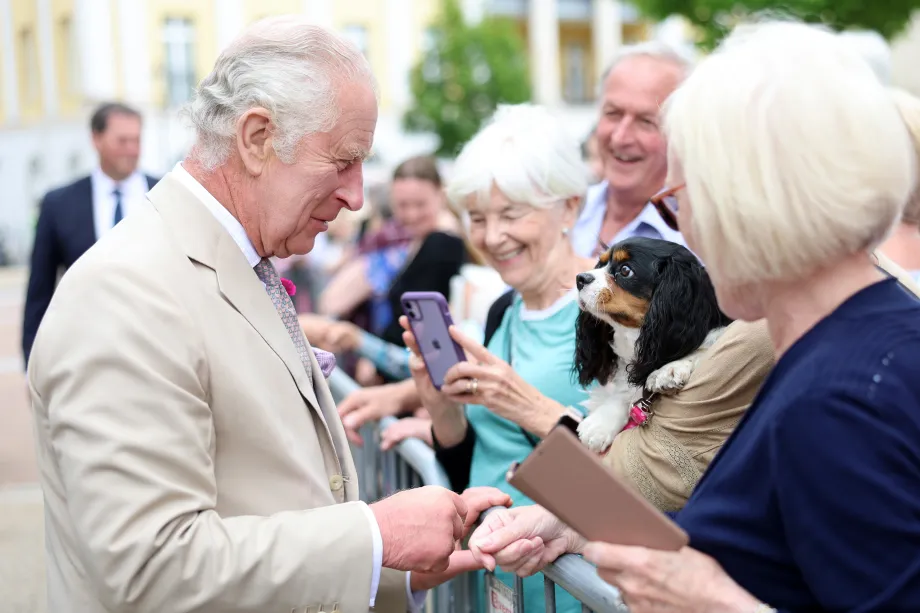 The King is greeted by crowds in Poundbury