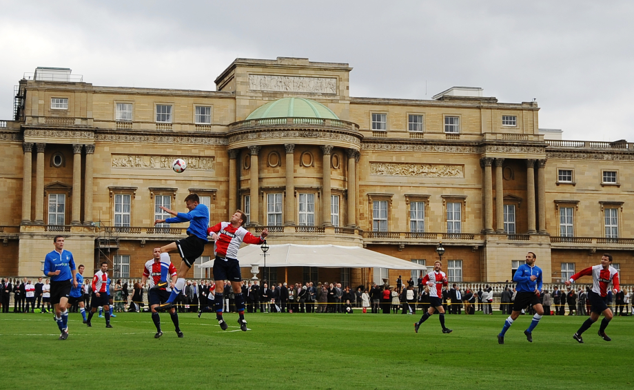 A football match takes place at Buckingham Palace
