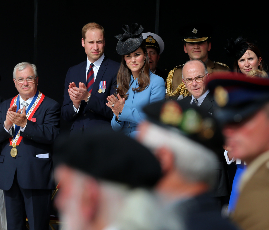 The Prince and Princess of Wales watch Normandy veterans parade in Arromanches, France