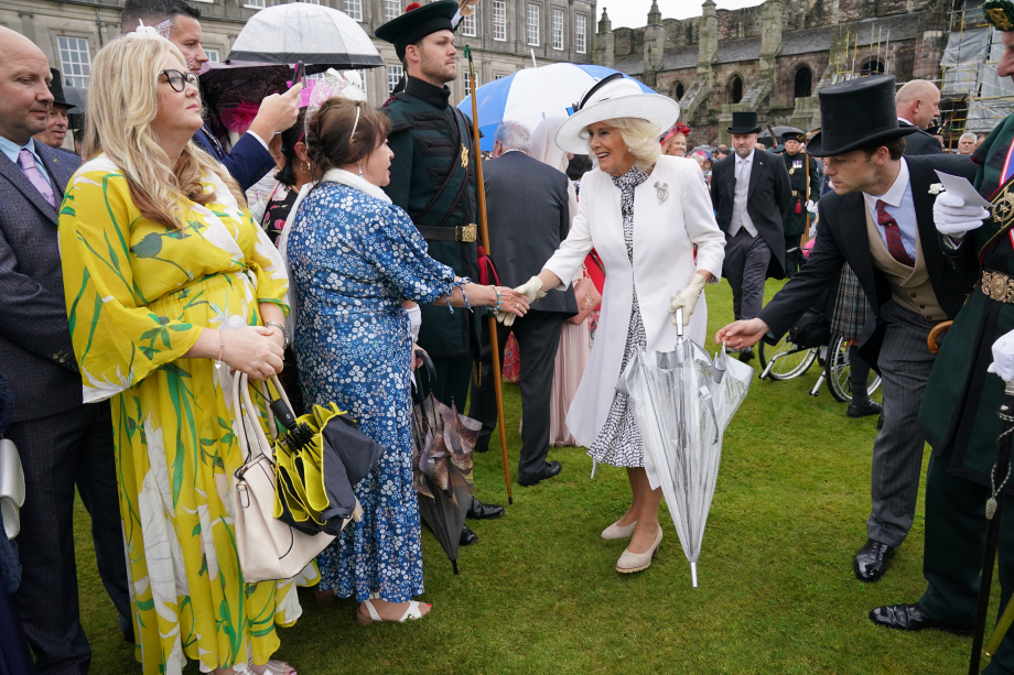 The Queen meets guests at a Garden Party