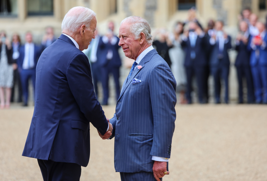 The King greets President Biden