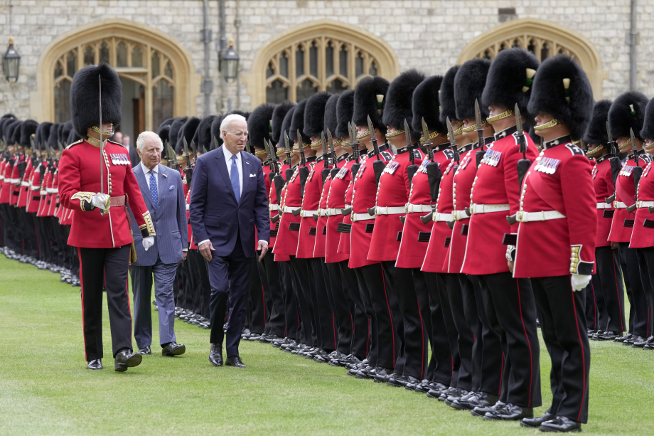 The King and President Biden inspect a Guard of Honour at Windsor Castle