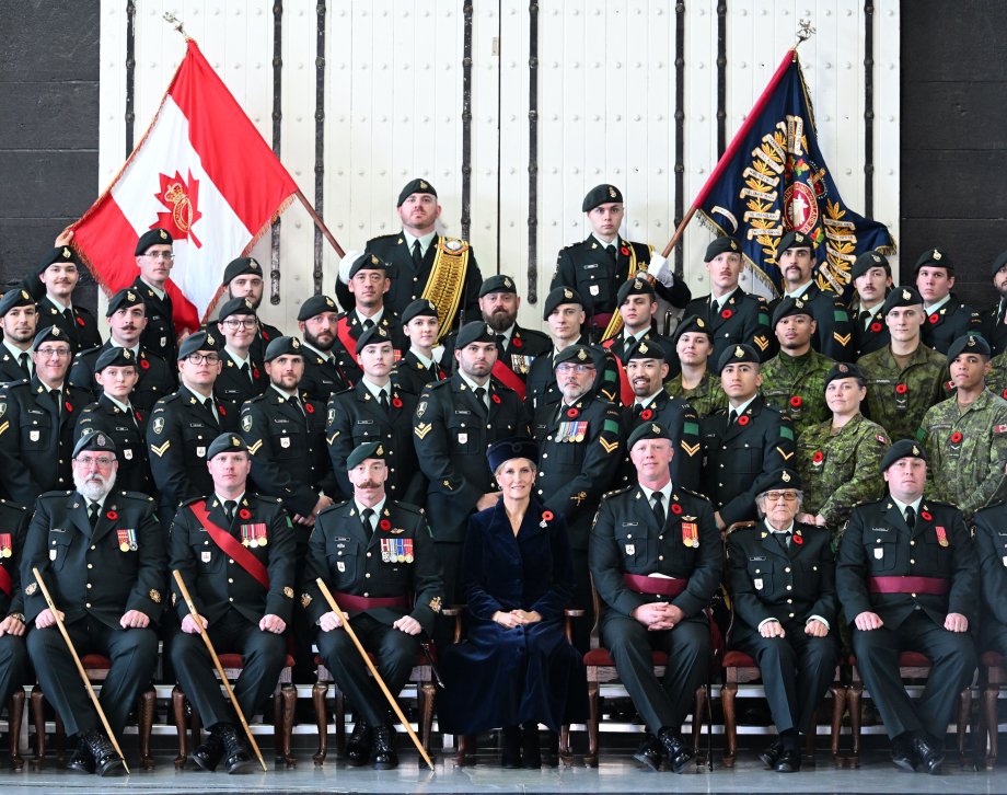 The Duchess takes part in a regimental photograph
