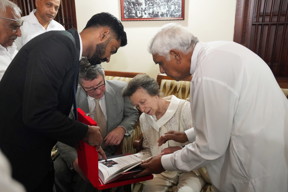 The Princess Royal and her husband Vice Admiral Sir Timothy Laurence (third right) receive a gift from acting custodian Mahinda Dela (right) during a visit the Temple of the Sacred Tooth Relic in Kandy during day two of their visit to mark 75 years of diplomatic relations between the UK and Sri Lanka