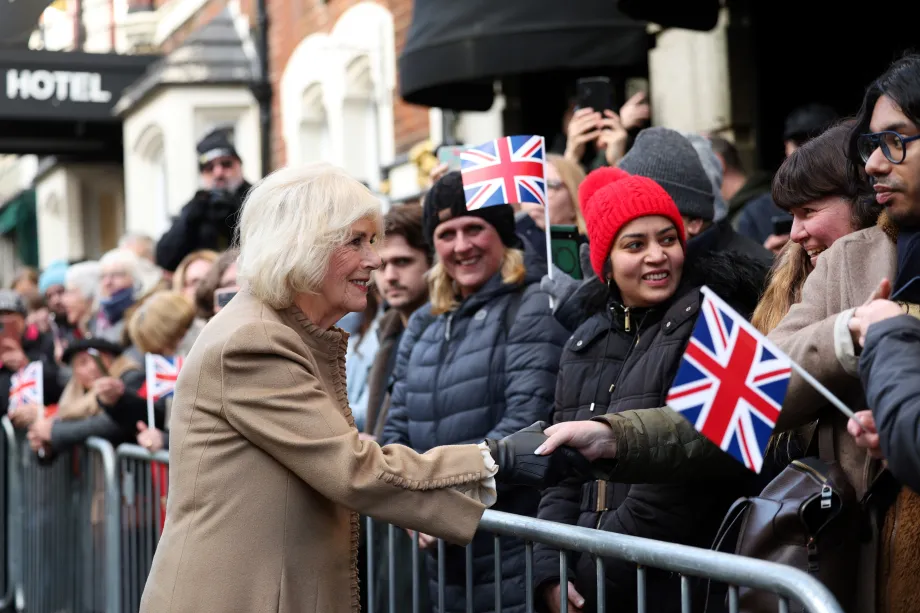 Queen Camilla receives get well cards for her husband King Charles III, during a visit to Deacon & Son, one of the oldest family run businesses in Swindon, Wilsthire, as the business celebrates 175 years of trading.