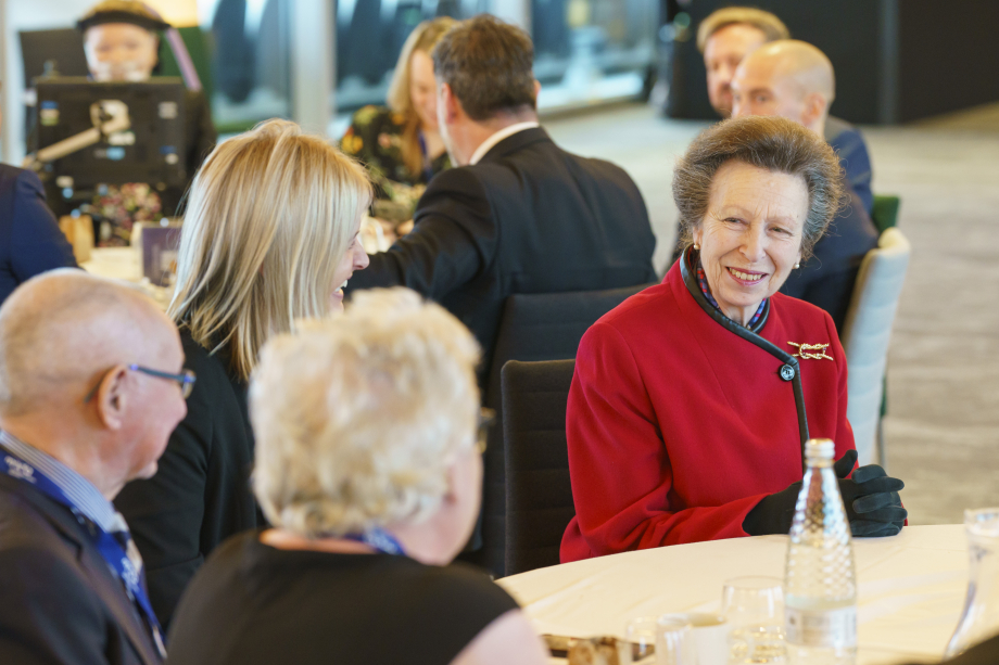 The Princess Royal at a round table with fundraisers 
