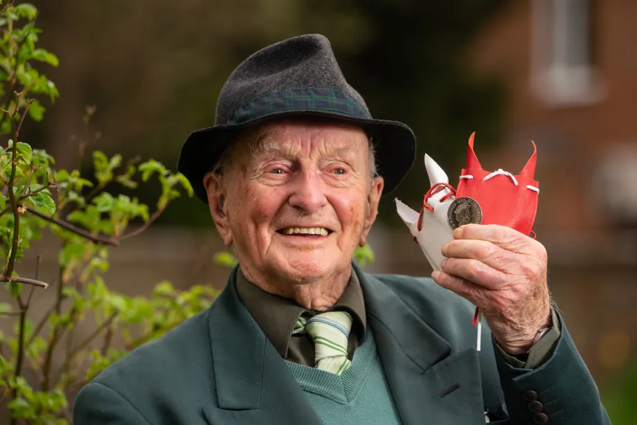 A pensioner with his Maundy money
