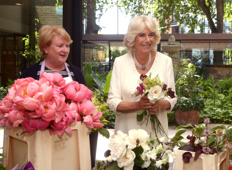 The Queen joins Floral Angels to make posies at The Garden Museum