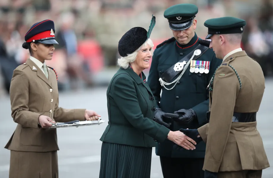 The then Duchess of Cornwall attends a medals parade