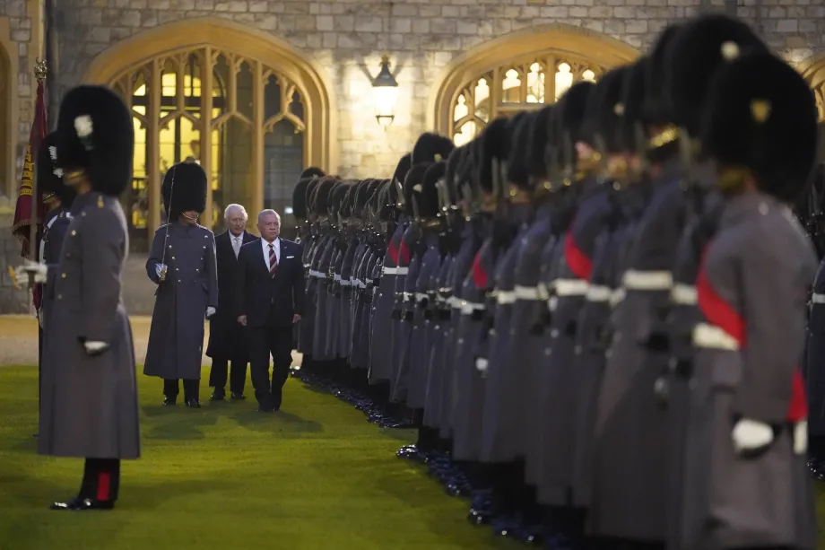 Both of Their Majesties inspect the Guard of Honour