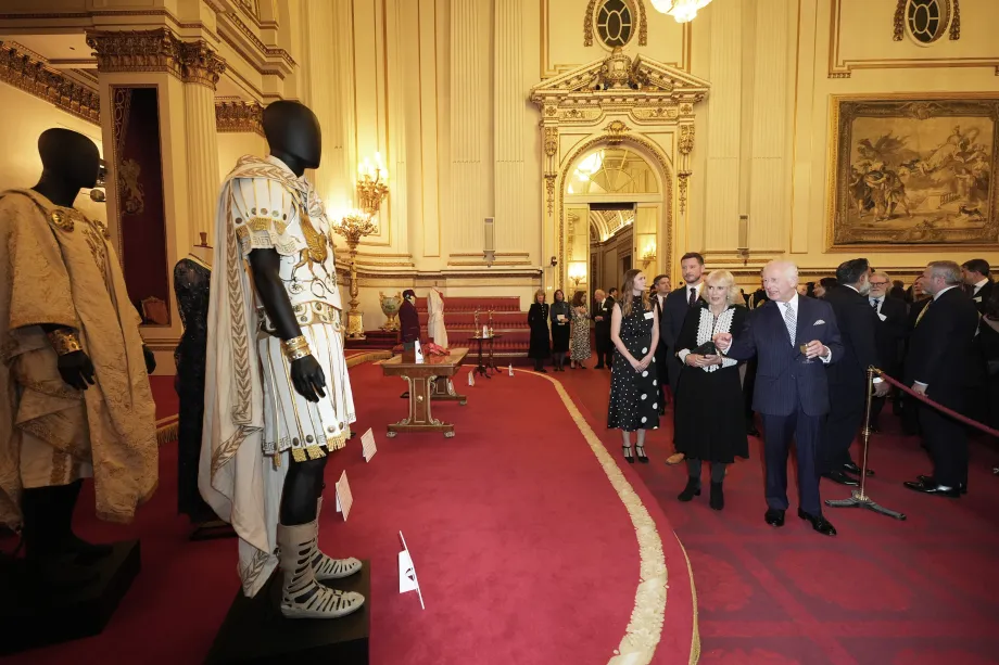 The King and Queen view costumes displayed in the State Ballroom